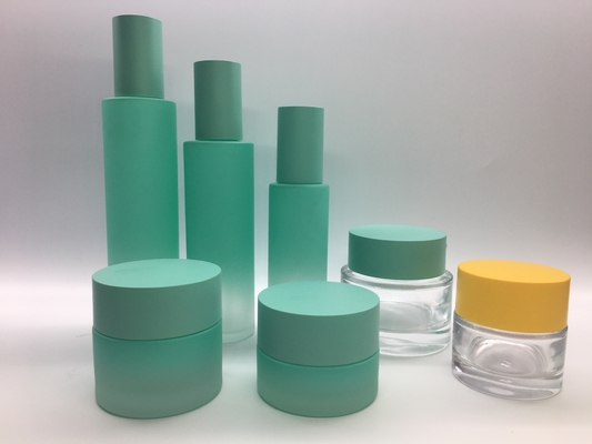Rechte ronde glazen lotionpompfles en zalfpotje voor huidverzorgingsverpakkingen